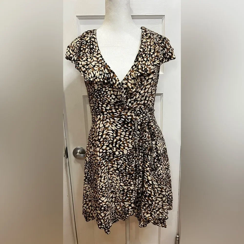 FREE PEOPLE French Quarter Mini Wrap Dress Size XS Animal Print Brown